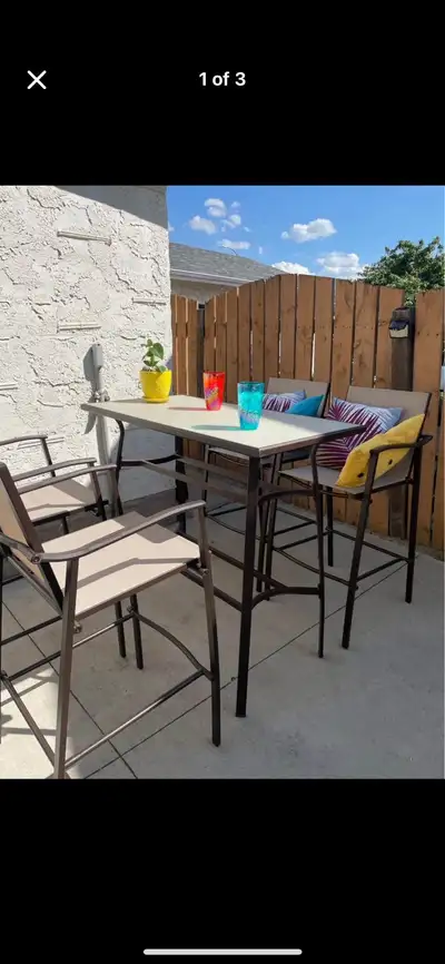 Beautiful glass top high table. It's always been stored inside and it's in really good condition. Ta...