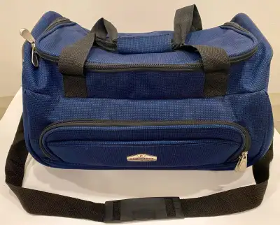 Carry-in luggage. Brand: Cambridge. Colour: Navy Blue. Very strong quality zippers. Handle plus cros...