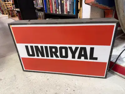 Double sided Uniroyal tire sign, View more