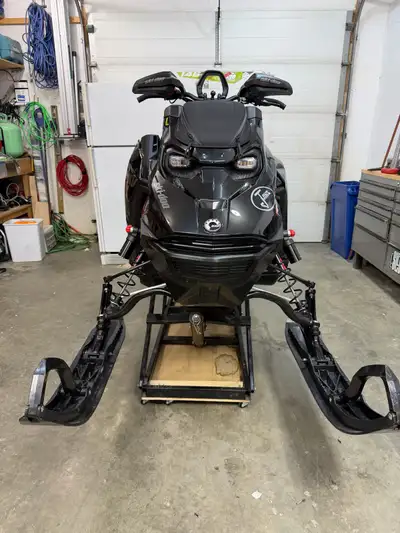 I'm offering a 2023 Ski-Doo Summit Expert 850 Turbo, a high-performance snowmobile. Here are some ad...