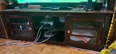 TV cabinet with storages. Holds upto 70 inch TV Used for 3 years Bought for $250 Price Negotiable No...