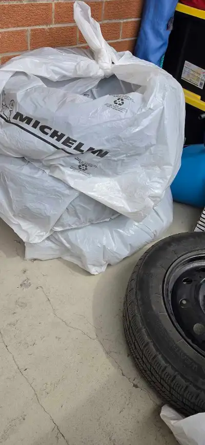 Selling a set of 4 Firestone Winterforce winter tires mounted on steel rims. Tire size: 195/65R15 Mo...