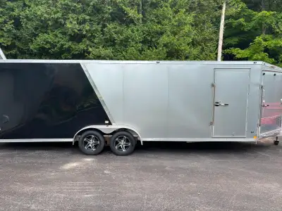 nice trailer, clean, hardly used, has two fuel doors, back door, front door, LED lights, 2" ball, go...