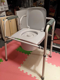 White commode with adjustable frame