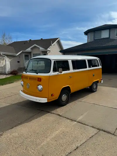 1976 Volkswagen Kombi Tin Top Campmobile, sleeps 2, seats 4 bench folds out to a bed Custom cabinets...