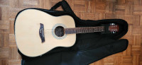 Full size acoustic guitar with case and accessories