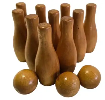 PARKER PICKERS - In very good condition. Including 3 wooden bowling balls. Pins are 3.5"H.