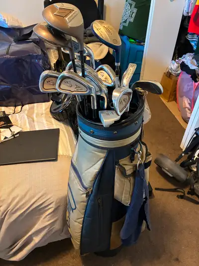 Golf clubs with trolley, View more