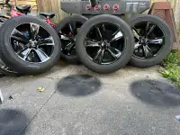 18” 5X115 dodge rims with  Uni Royal Tiger Paw tires 