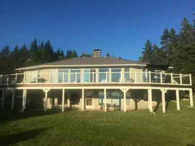 Large, cozy, fully furnished, well appointed home in an elevated private setting with an expansive v...