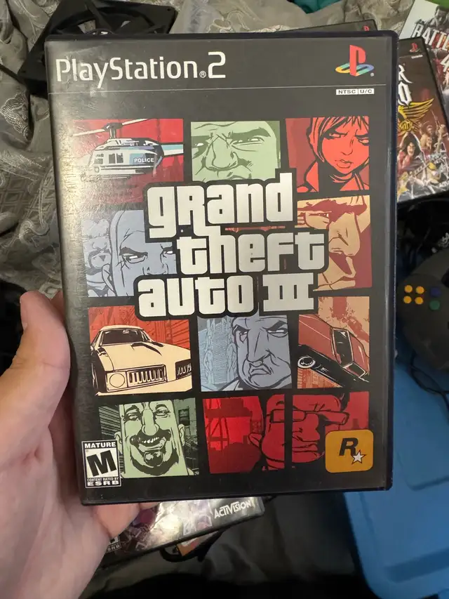 PlayStation 2 slim with games63347537469827124