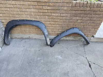 chevy or gmc fender flare plastic. one front one rear $50 each I belive them to be for a 90s body st...