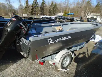 2015 Kingfisher 1825 Warrior Tiller with a 2015 Suzuki DF90. Exterior is unpainted aluminum. Factory...