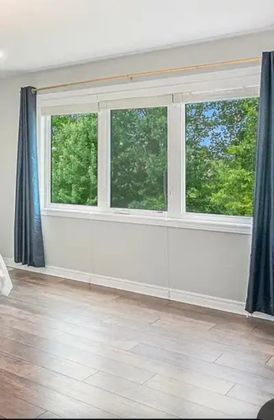 Gold curtain rod and blue curtains, View more
