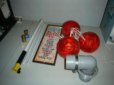sold my rv these items are laying around sewer hose end ,2 water pressure regulators, toilet cleanin...