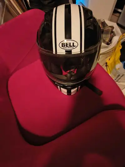 Black with white stripes it's a revolver! For medium to smaller head I'm not sure if it says size 11...