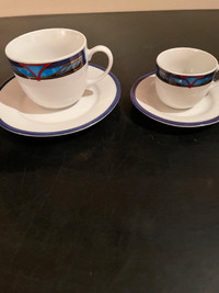 Cups and saucers.                                   
