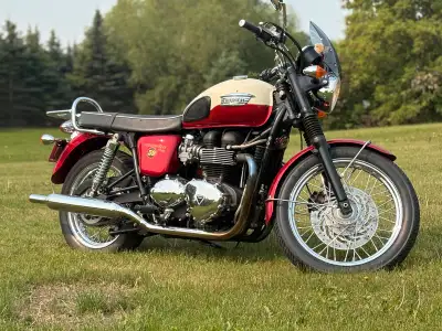 I'm selling a 2012 Triumph T100, a classic beauty in excellent condition, perfect for cruising and w...