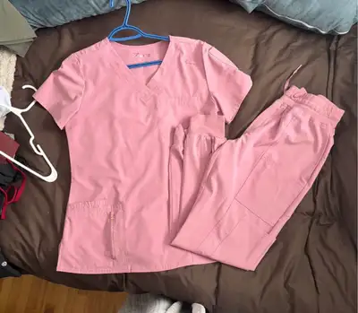 Both worn once. Paid 30$ for each top & 35$ for each botttoms. Looking to get 30$ per set. Take both...