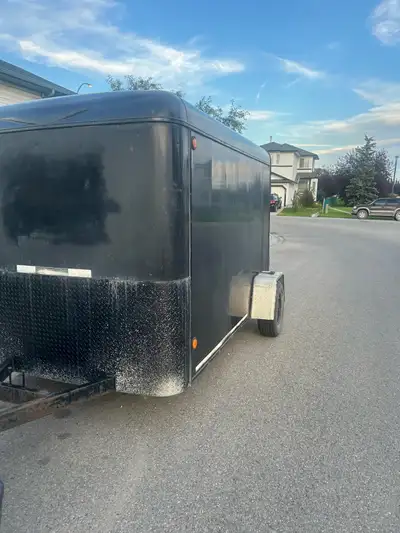 2007 Good condition heavy duty cargo trailer for sale 6x10 Extra high. solid build. Is ban just use...