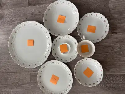 Beautiful elegant dinner set in great condition except one large dinner plate has a small chip. Almo...