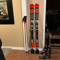 156  Rossignol ski . Low km . Boots . Sold , poles 
