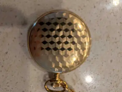 Vintage mechanical (manual winding) Bulova pocket watch purchased new in 1977, with 10 inch chain.