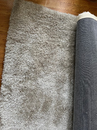 5' x 7' light beige rug - never used