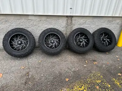 Fuel Runner 20x10 -18 offset, 35/12.5 Toyo RT Trail Bolt patter 6x139.7 Tires are new last summer. 9...