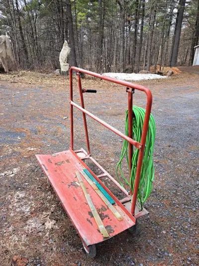 Drywall or sheet goods cart, has some paint peeling but rolls fine. Been stored inside the whole tim...