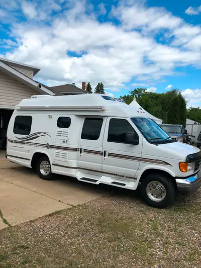 2003 Pleasure Way, king or twin bed, furnace, roof air, cab air, 3-way fridge, ho0t water tank, micr...