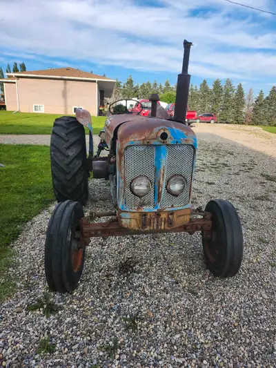 2 fordson tractors. Super runs but smokes. Has new starter and solenoid. Was sitting for a number of...