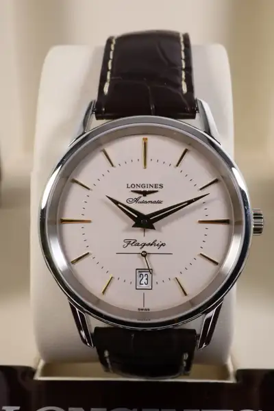 Up for sale is a Longines Flagship Heritage Ref L4.795.4.78.2 38.5mm Case, light champagne/tan dial....