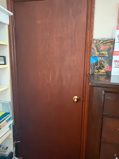 18 Oak Veneer Doors including hinges. Well loved but lots of life left in them. Take all for $75 or...