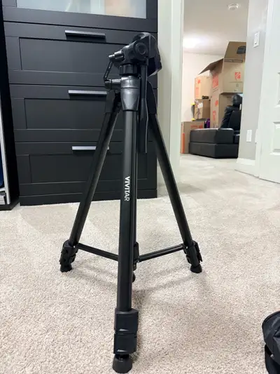 This Vivitar 67" tripod is perfect for photographers and videographers looking for a stable and adju...