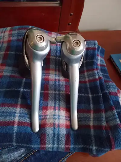 Shimano RSX STI 7 speed shifters Shimano Model number ST-A410 This is the cheapest set offered in Ca...