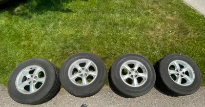 4 Firestone All Season Tires on Rims from a 2005 Mazda Tribute. Tires: 235mm 70 R16 ALMOST NEW < 500...