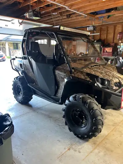 Camouflage Can Am 2013 800 xt side by side has new battery ,brakes , new front winch , tie rod ends...