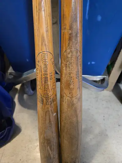 2 vintage louisville slugger bats, View more