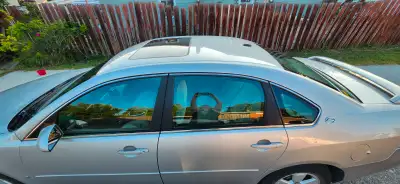 Selling my 06 Chevy impala LT automatic, with auto start,power windows and doors. lady driven for th...