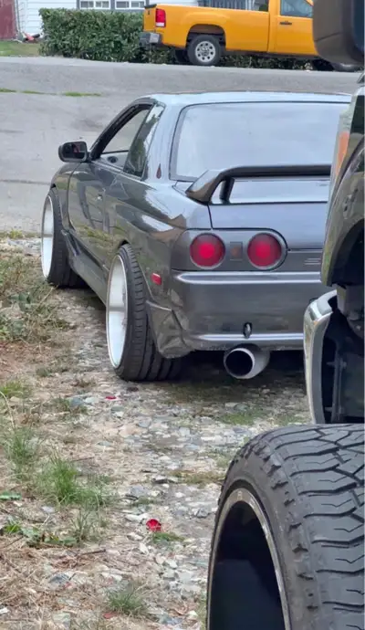 TESTING WATERS. This 1990 Nissan Skyline GTS is a legendary performance coupe that comes in a sleek...