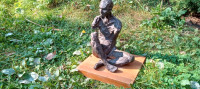 Sculpture male seated figure