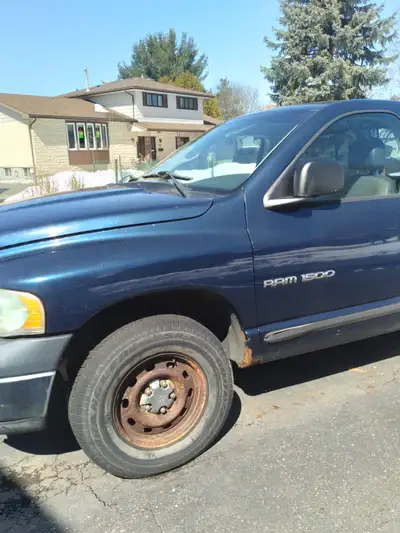 2003 DODGE RAM 4X4 V8 AUTOMATIC REG CAB REG BOX RUNS AND 4X4 EXCELLENT COND. FRAME IS SOLID! WOULD M...