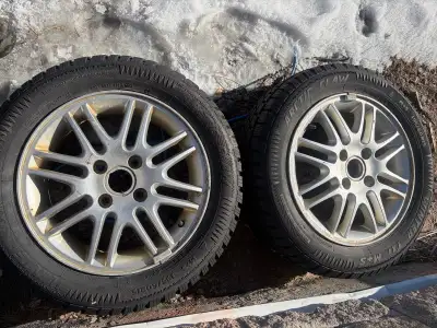 2x OEM Ford Focus 15” 4 bolt rims + winter tires 195/60R15 tires are pretty much new $50