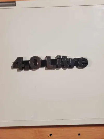 4.0 Liter decel with 3M adhesive on the back .