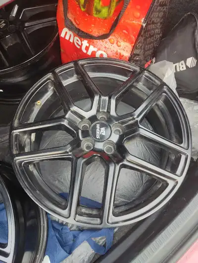 Used like new 17 inch alloy rims. The bolt spacing is 5-100. No cracks or Bends or scratches ! Askin...