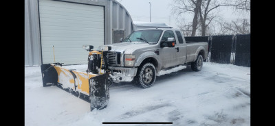 2010 F250 with 9’ V Plow