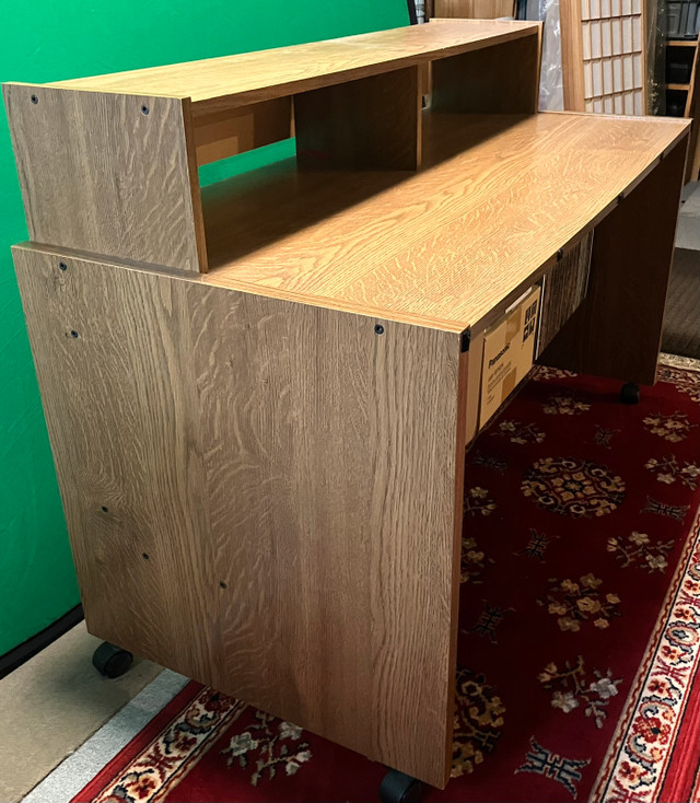 Computer desk with removable hutch and swivel casters Desks