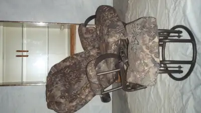 Recliner glider with ottoman it also swivels Fabric in great shape no holes or tares. Only 15 min. d...
