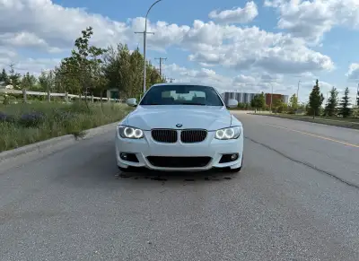 2012 BMW 335i N55 AWD Fully loaded with red heated leather seats, navigation, M Package, sunroof, pr...